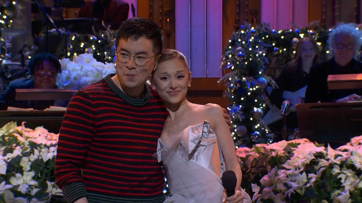 Bowen Yang Crashes Ariana Grande’s ‘SNL’ Monologue to Sing ‘All I Want for Christmas Is You’ | Video