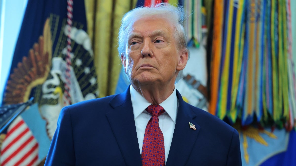 Department of Justice Accused of Removing Trump Photos From Epstein Files Release