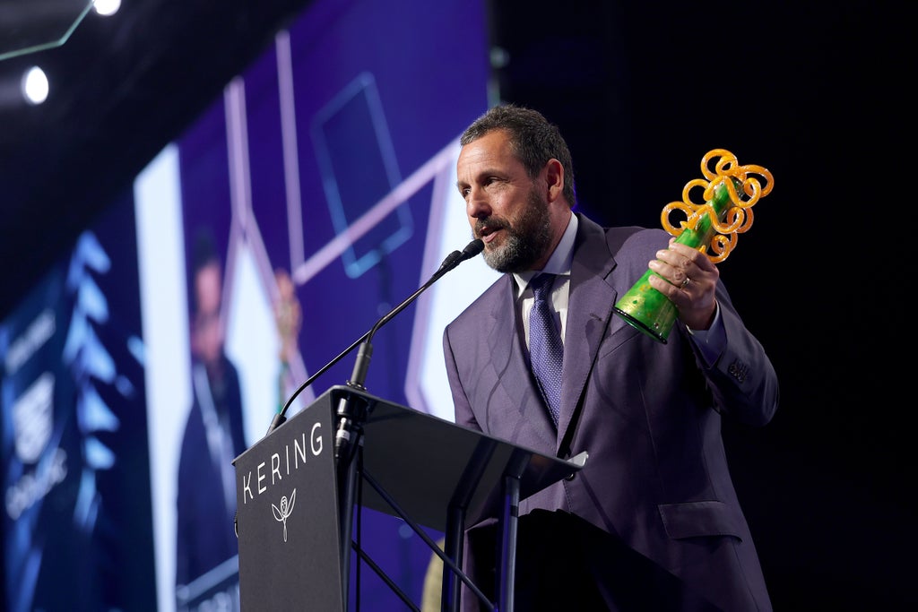 Adam Sandler accepts the Chairman’s Award on-stage at the 37th Annual Palm Springs International Film Awards