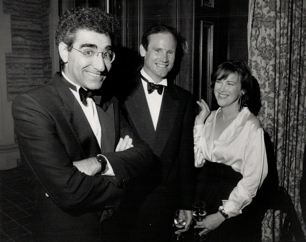 Comedy kings: Actor Eugene Levy (left) hams for the camera with actress Catherine O'Hara (right); who was accompanied by her beau; Bo Welch