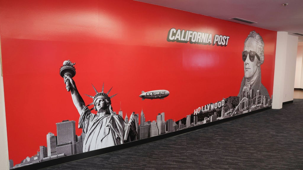 A cartoony rendering of New York Post founder and former Treasury Secretary Alexander Hamilton overlooking Los Angeles meets you as you enter the Post's offices