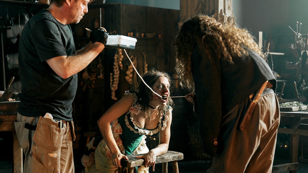 Makeup effects of a giant tapeworm coming out of Elvira's (Lea Myren) mouth in "The Ugly Stepsister" (Shudder)