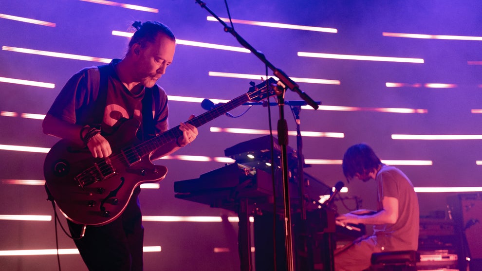 Thom Yorke and Jonny Greenwood of The Smile performing onstage
