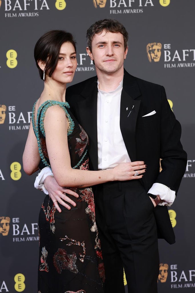 Gracie Abrams, wearing Chanel, and Paul Mescal in Prada. Source: Getty