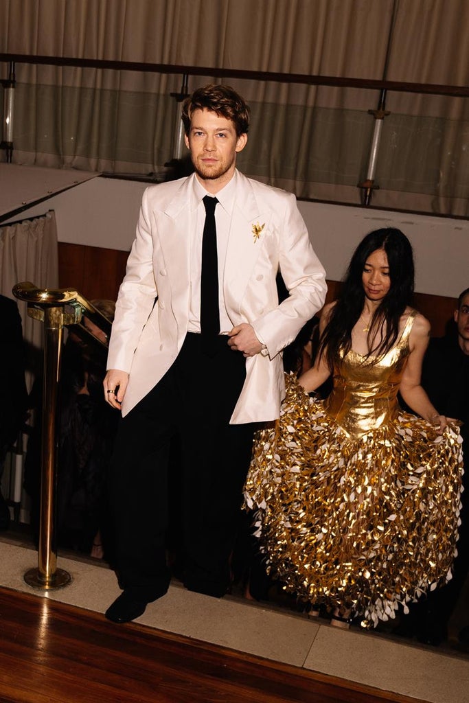 Joe Alwyn wearing Valentino and Chloe Zhao in Gabriela Hearst. Source: Getty