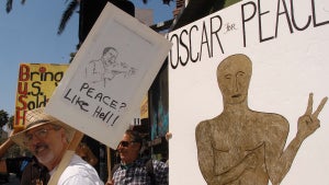 75th Oscars - Peace sign