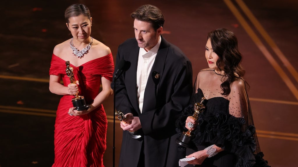 Maggie Kang, Chris Appelhans, and Michelle Wong (Credit: Kevin Winters/Getty Images)