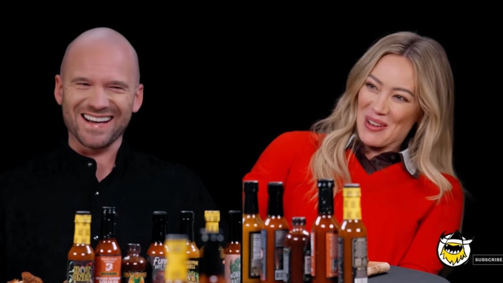Sean Evans and Hilary Duff on "Hot Ones" (YouTube screenshot)