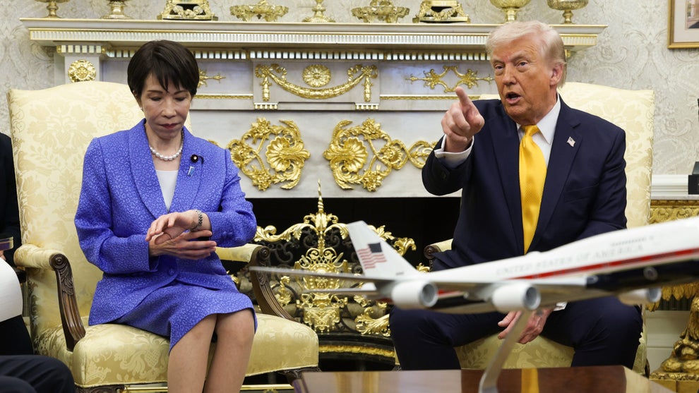 Prime Minister of Japan Sanae Takaichi looks at her watch as U.S. President Donald Trump speaks during a bilateral meeting in the Oval Office of the White House on March 19, 2026 in Washington, DC. (Alex Wong/Getty Images)