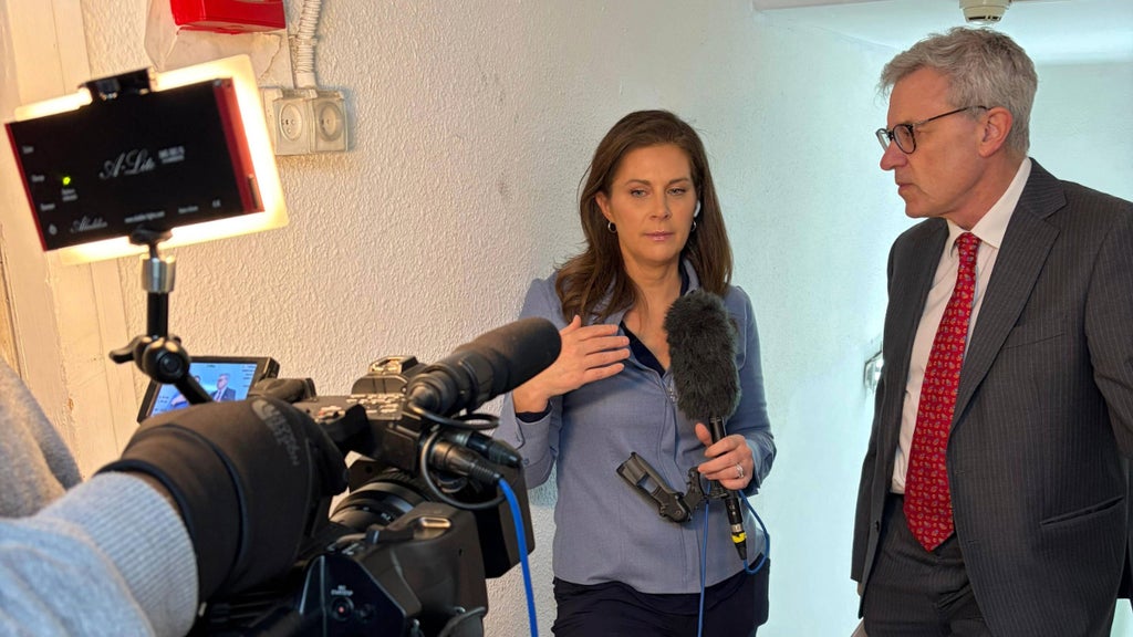 Erin Burnett with a guest on “OutFront." 