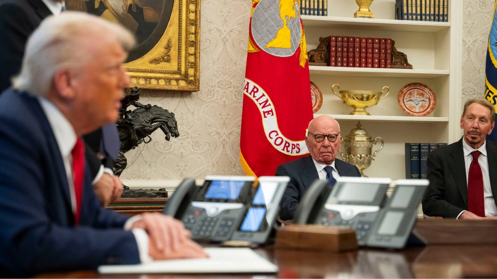 Media mogul Rupert Murdoch and tech entrepreneur Larry Ellison look on as President Donald Trump speaks to members of the media as he signs proclamations, initiatives and appointments inside the Oval Office at the White House in Washington, DC on February 03, 2025. (Photo by Craig Hudson for The Washington Post via Getty Images)