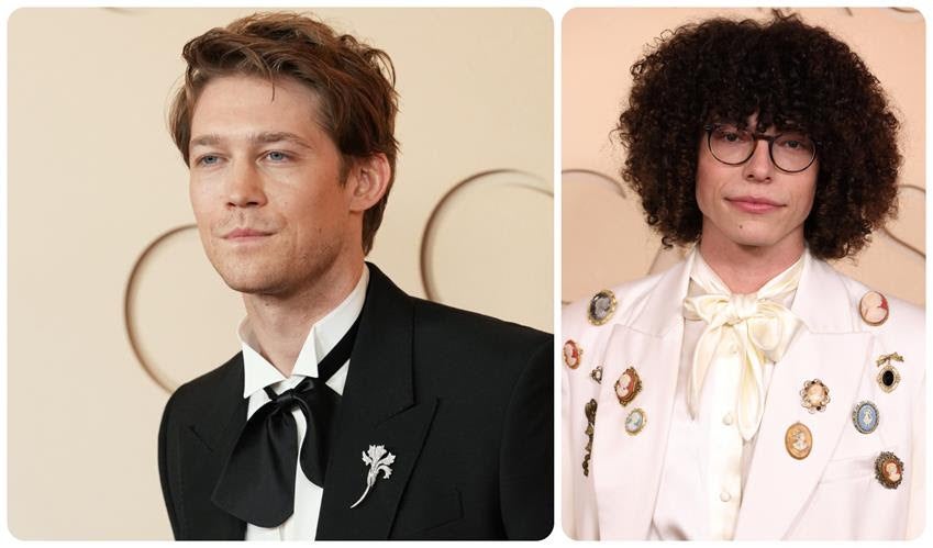 Joe Alwyn in a Chaumet brooch and Reece Feldman in a Tanner Fletcher look. Source: Getty