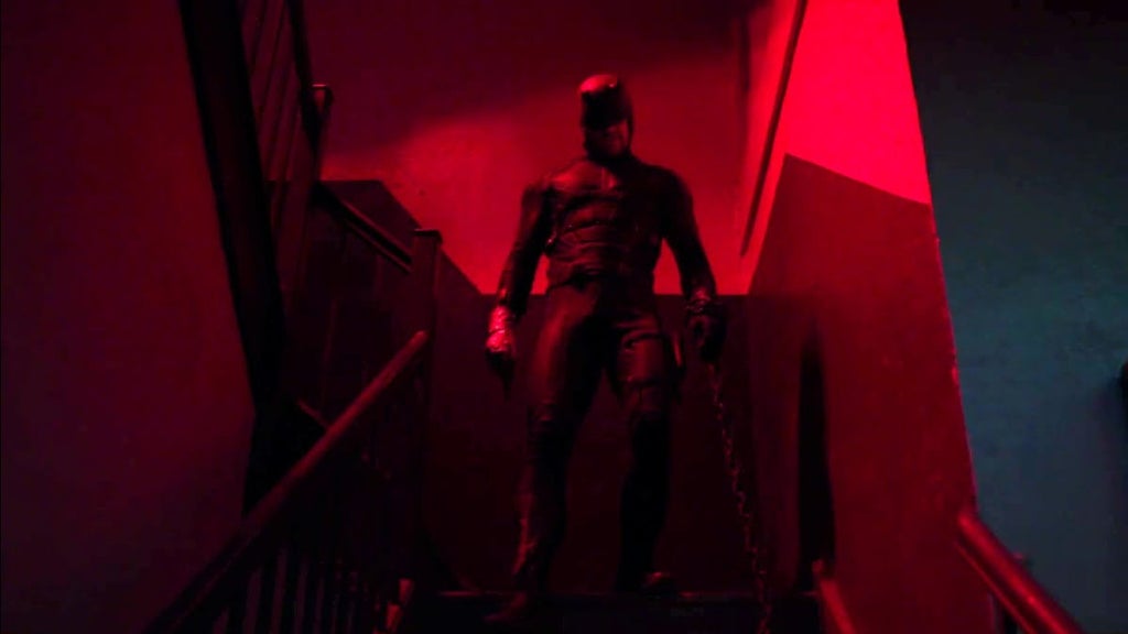 Daredevil on a red-lit staircase in "Daredevil" Season 2