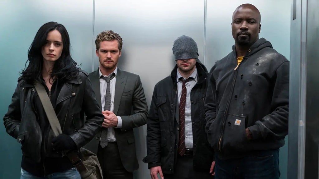 Jessica Jones (Kristen Ritter), Iron Fist (Finn Jones), Daredevil (Charlie Cox) and Luke Cage (MIke Colter) in "The Defenders"
