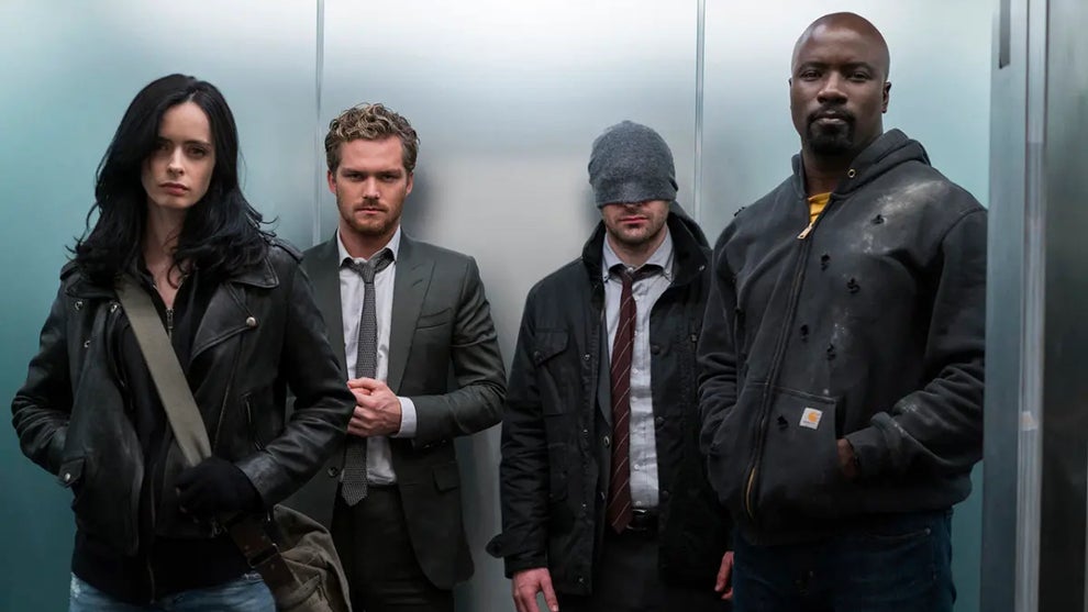 Jessica Jones (Kristen Ritter), Iron Fist (Finn Jones), Daredevil (Charlie Cox) and Luke Cage (MIke Colter) in "The Defenders"