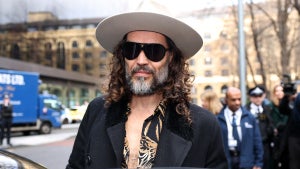 Russell Brand leaves Southwark Crown Court in south London on Feb. 24, 2026 after attending a one-day plea and trial preparation hearing. (Adrian Dennis/AFP via Getty Images)