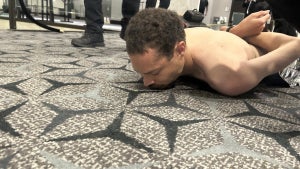 US President Trump posted to social media a photo of law enforcement detaining a suspect following a shooting incident at the White House Correspondents' Dinner in Washington, D.C.