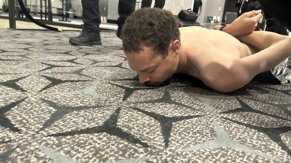 US President Trump posted to social media a photo of law enforcement detaining a suspect following a shooting incident at the White House Correspondents' Dinner in Washington, D.C.