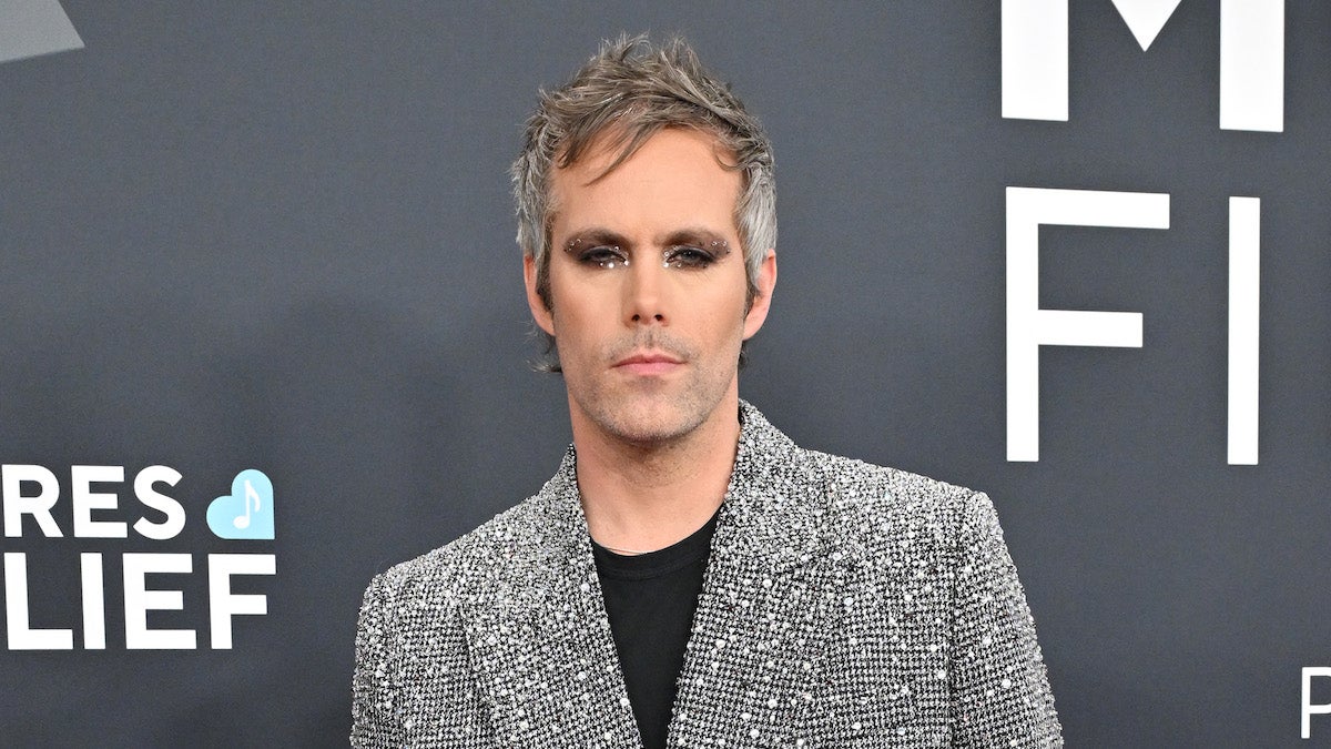 Justin Tranter Reveals How Their ‘Unfamous’ Podcast Utilizes Their Songwriting Superpower