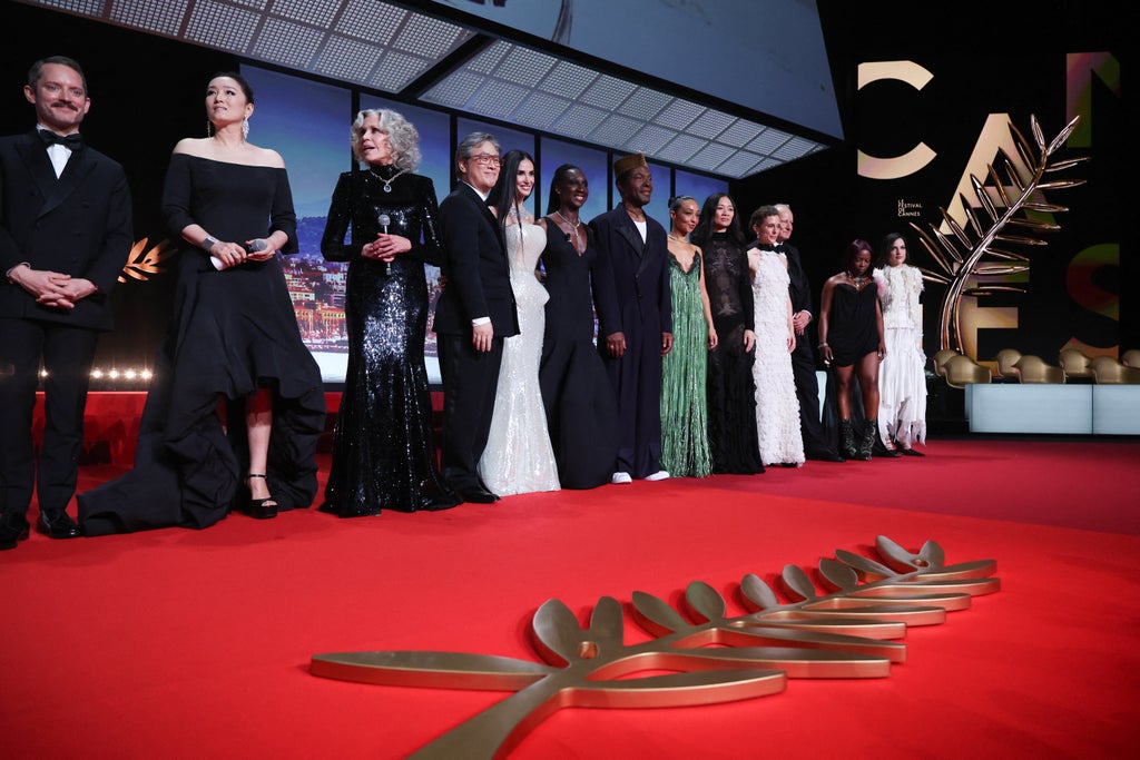 (From L) US actor Elijah Wood, Chinese actress Gong Li, US actress Jane Fonda, South Korean director, screenwriter and producer Park Chan-wook, US actress and producer Demi Moore, French-Malian actress and master of Ceremony Eye Haidara, Ivorian actor Isaach De Bankole, Irish-Ethiopian actress and producer Ruth Negga, Chinese director and screenwriter Chloe Zhao, Belgian director and screenwriter Laura Wandel, Member of the jury Swedish actor Stellan Skarsgard, French-Congolese singer and rapper Theodora and French singer-songwriter Oklou pose
