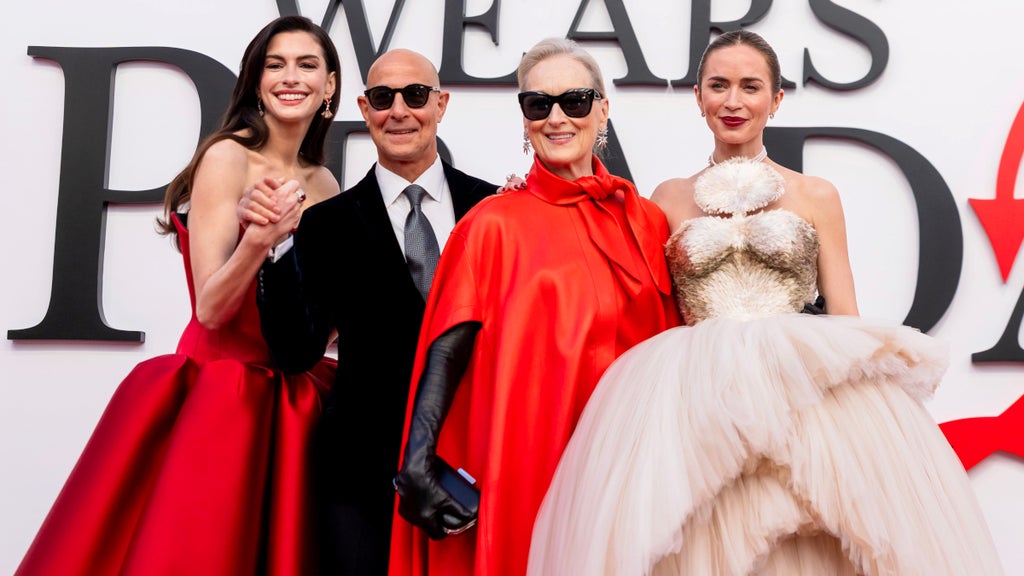 Anne Hathaway, Stanley Tucci, Meryl Streep and Emily Blunt pose for red carpet photos at a premiere screening of "The Devil Wears Prada 2"