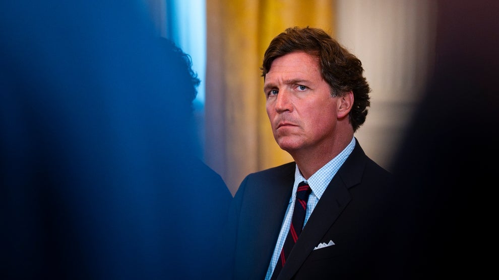 Tucker Carlson, former FOX News host and current host of The Tucker Carlson Show, attends a meeting with oil executives in the East Room of the White House on January 9, 2026 in Washington, DC