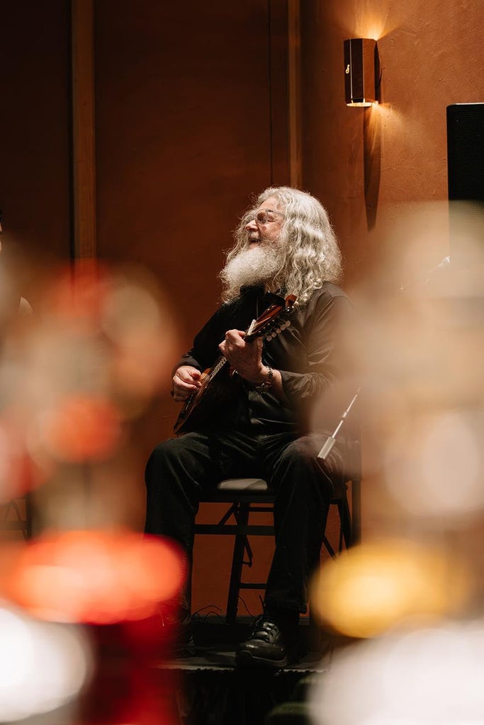Oscar-winning composer Gustavo Santaolalla performing at the launch of the Ronroco fragrance at South Coast Plaza. Source: Getty