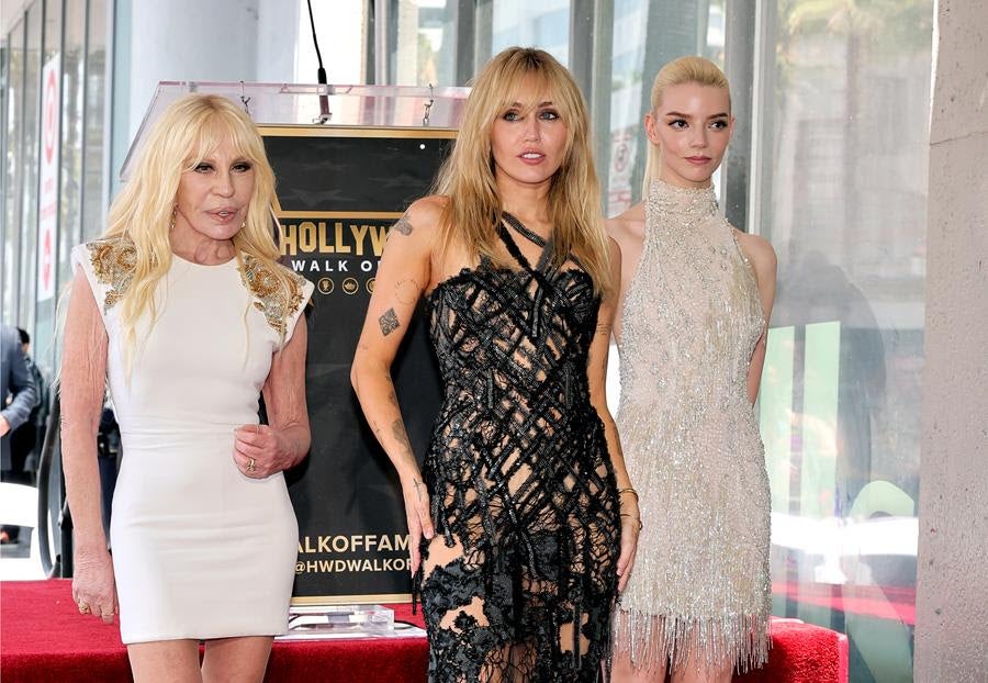 Donatella Versace, Miley Cyrus and Anya Taylor-Joy attend the Hollywood Walk of Fame Star ceremony honoring Miley Cyrus on May 22, 2026 in Hollywood, California. Source: Getty