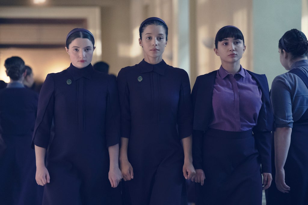 Lucy Halliday, Chase Infiniti and Rowan Blanchard in "The Testaments" (Disney/Steve Wilkie)
