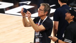 Ben Stiller records a video during the third quarter in Game Five of the 2026 NBA Finals on June 13, 2026 in San Antonio, Texas. (Gregory Shamus/Getty Images)