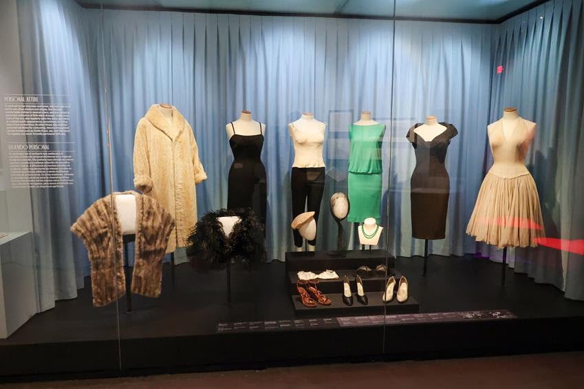 Pieces from Monroe's personal wardrobe, including a Jax dress at far right. Source: Getty
