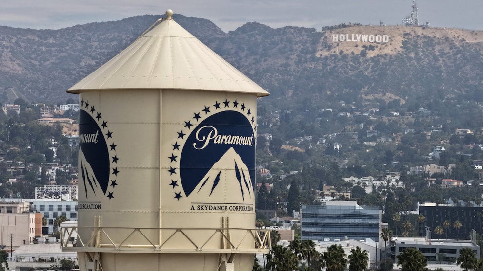 The Hollywood sign overlooks the Paramount Studios lot's iconic water tower in Los Angeles. (Justin Sullivan/Getty Images)