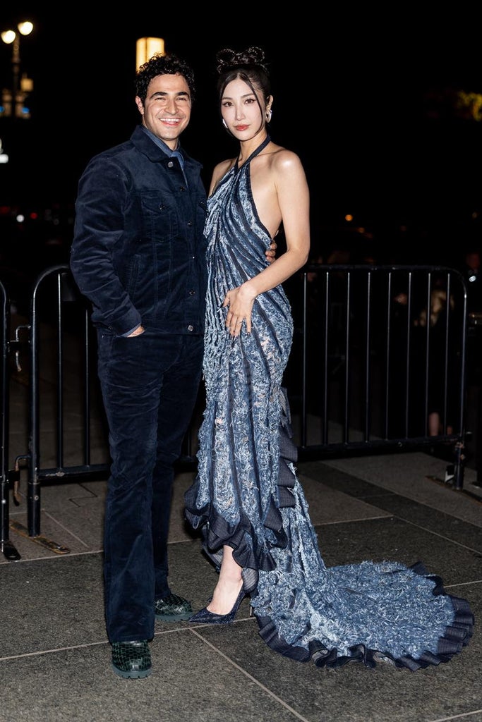 Designer Zac Posen and Ejae, wearing a Gap Studio distressed denim gown, attend the 2025 CFDA Awards. Source: Getty