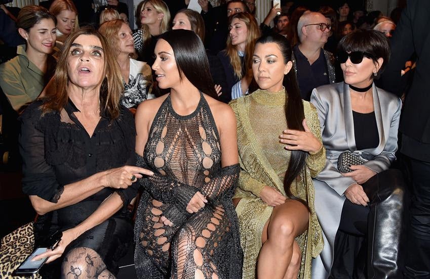 Carine Roitfeld, Kim Kardashian, Kourtney Kardashian and Kris Jenner attend the Balmain Spring/Summer 2017 show on Sept. 29, 2016. Source: Getty