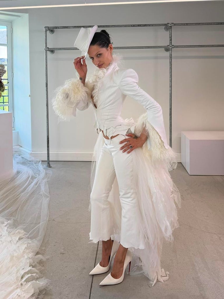 French fashion couture house Matières Fécales launched its bridal wear at the L.A. wedding of singer Gabbriette Bechtel pictured here at her final Paris fitting. Source: Matières Fécales