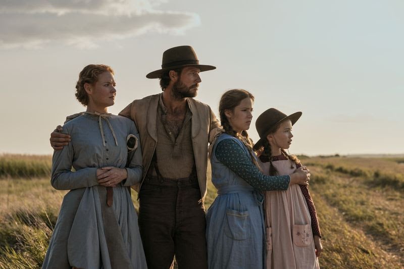 Crosby Fitzgerald (Caroline Ingalls), Luke Bracey (Charles Ingalls), Skywalker Hughes (Mary Ingalls) and Alice Halsey (Laura Ingalls). Source: Eric Zachanowich/Netflix