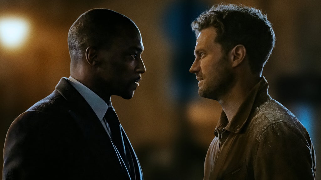 Anthony Mackie and Jamie Dornan in "12 12 12" (Apple TV)