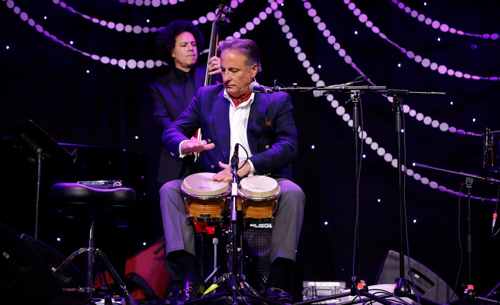 Andy Garcia performs on the timbales at the 41st Imagen Awards