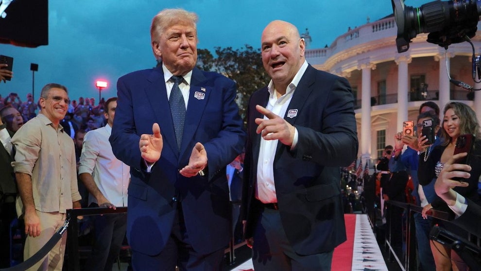 President Donald Trump and UFC President and CEO Dana White walk out of the White House onto the South Lawn for the UFC Freedom 250 fight on June 14, 2026 in Washington, DC. President Trump is hosting a series of Ultimate Fighting Championship matches on his 80th birthday, which the White House is calling "a once-in-a-generation celebration of the American fighting spirit.” (Photo by Chip Somodevilla/Getty Images)