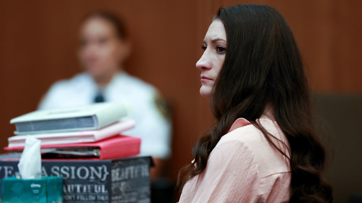 Lindsay Clancy listens to testimony