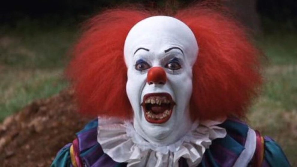 Tim Curry as Pennywise in "It"