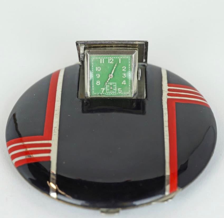 1930s era compact with clock. Source: Makeup Archive