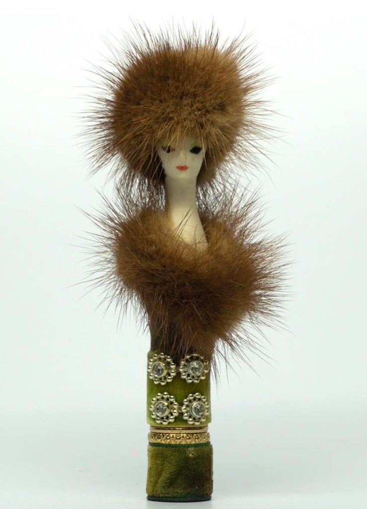1960s Revlon Couturine lipstick doll. Source: Makeup Archive
