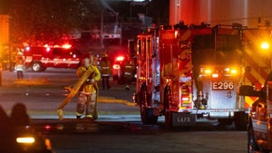 First responders work on the scene after a news helicopter crashed in Chatsworth, a suburban neighborhood of Los Angeles, California on September 15, 2026. Three people were killed and one person was hospitalized after the helicopter went down between two commercial buildings, igniting on fire instantly, according to the Los Angeles Fire Department. (Photo by Blake Fagan / AFP via Getty Images)