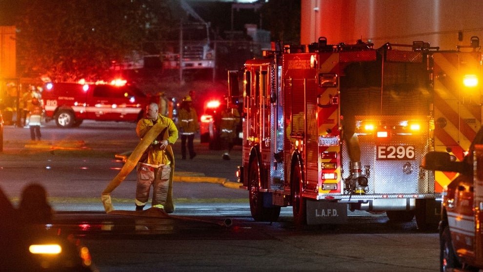 First responders work on the scene after a news helicopter crashed in Chatsworth, a suburban neighborhood of Los Angeles, California on September 15, 2026. Three people were killed and one person was hospitalized after the helicopter went down between two commercial buildings, igniting on fire instantly, according to the Los Angeles Fire Department. (Photo by Blake Fagan / AFP via Getty Images)