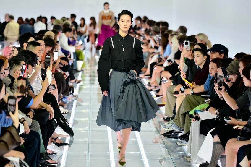 A model walks the Prada Spring 2027 runway at Milan fashion week, Sept. 22, 2026. Source: Getty