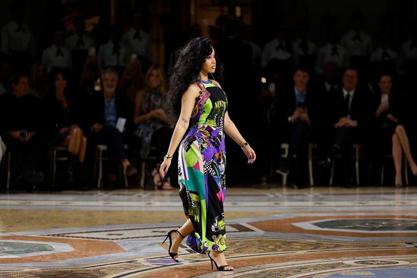 Cardi B walks the runway wearing Versace at Vogue World: Milano. Source: Getty