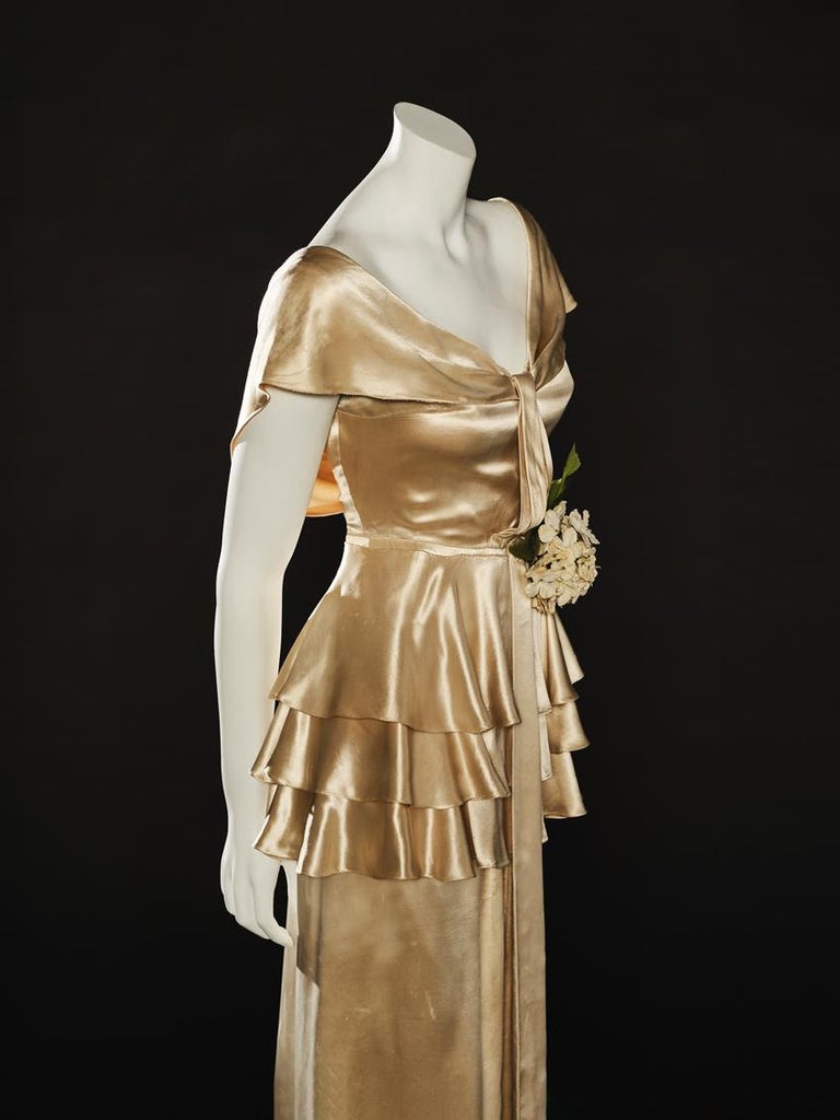 From the exhibition, an Adrian evening gown worn by Jean Harlow in Bombshell. Source: ASU FIDM Museum