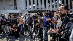 Camera crews and reporters gather during a World Press Freedom Day event in Gaza City, Palestine, on May 4, 2025. (Credit: Saeed Jaras/Middle East Images/AFP via Getty Images)