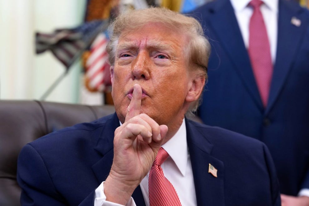 WASHINGTON, DC - OCTOBER 20: U.S. President Donald Trump gestures to reporters to be quiet during an event in the Oval Office of the White House on October 20, 2026 in Washington, DC. Trump and Vance announced a new $25 million dollar federal Fraud Whistle Blower Incentive Program with the Department of Justice to pay up to $30,000 to citizens who give verified tips that lead to a conviction or major enforcement action. (Photo by Andrew Harnik/Getty Images)